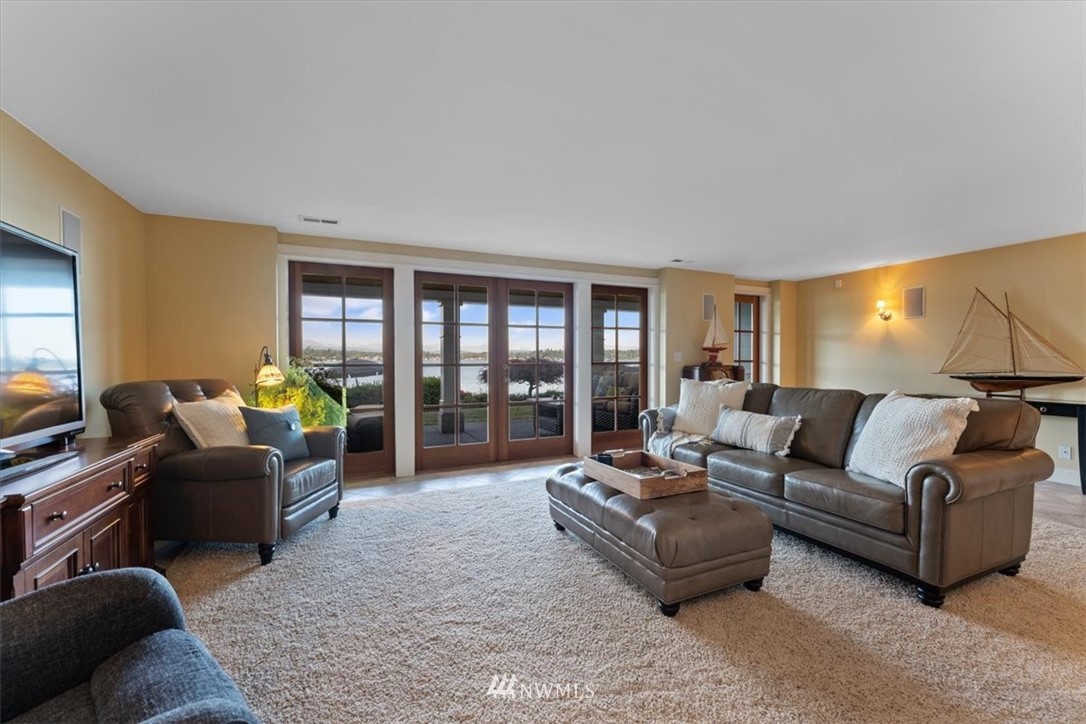 1707 Vernon Road Lake Stevens, WA 98258 - Photo 23 of 40 a living room with furniture and a flat screen tv