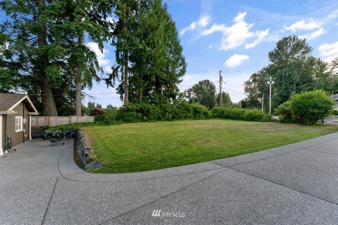 1707 Vernon Road Lake Stevens, WA 98258 - Photo 38 of 40 a view of a garden with large trees