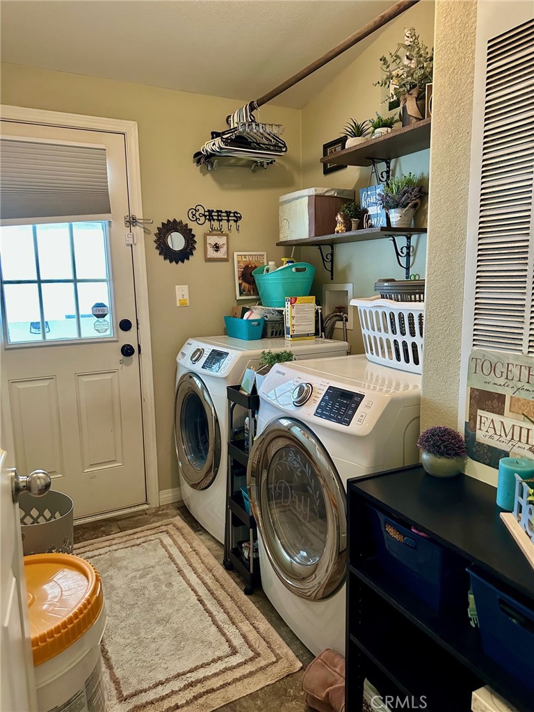 30000 Hasley Canyon Road, Unit 9 Valencia, CA 91384 - Photo 20 of 26 Laumdry room