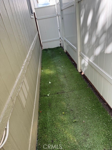 30000 Hasley Canyon Road, Unit 9 Valencia, CA 91384 - Photo 26 of 26 Dog run on side of home