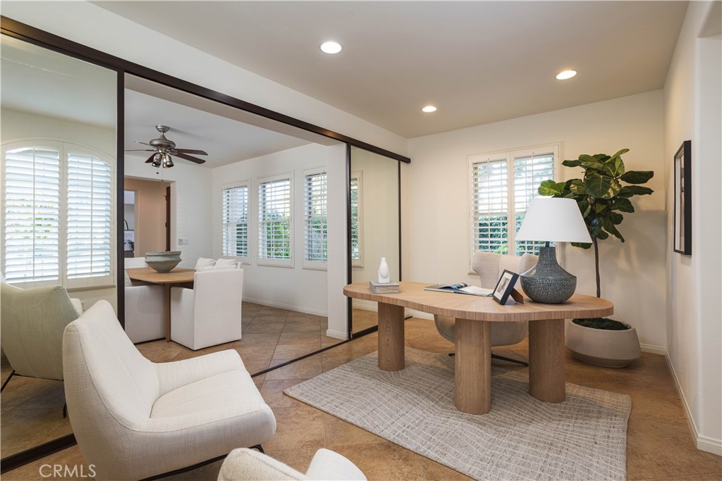 16 Via Elda San Clemente, CA 92673 - Photo 15 of 32 a living room with furniture a rug potted plant and windows