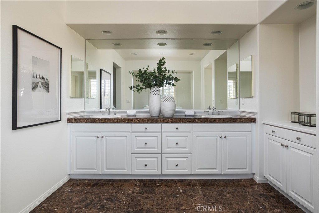 16 Via Elda San Clemente, CA 92673 - Photo 21 of 32 a bathroom with a sink and a mirror
