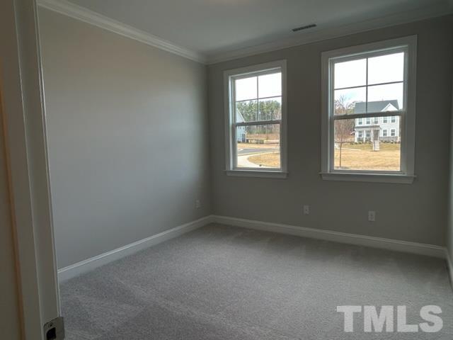 192 Edge Of Auburn Boulevard Raleigh, NC 27610 - Photo 12 of 44 an empty room with a window