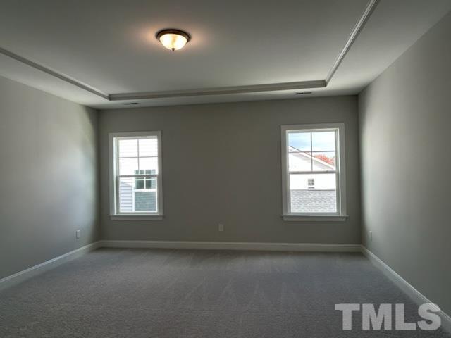 192 Edge Of Auburn Boulevard Raleigh, NC 27610 - Photo 20 of 44 an empty room with a window