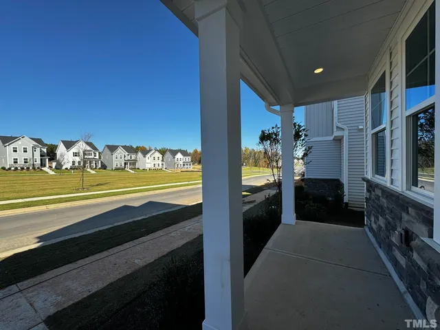 a view of swimming pool from a balcony