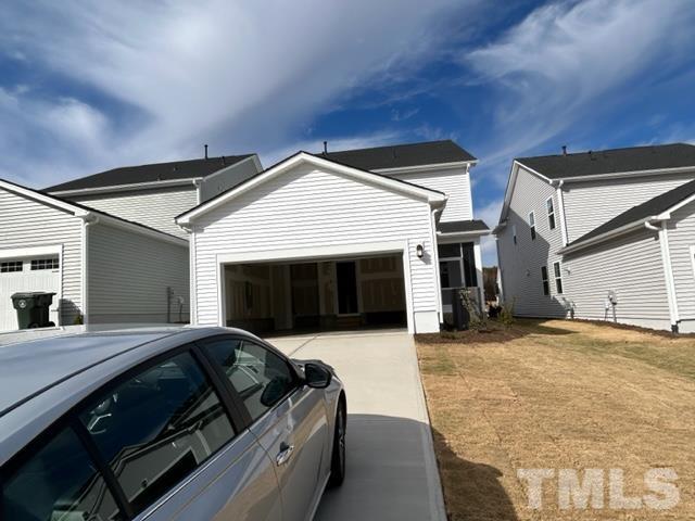 192 Edge Of Auburn Boulevard Raleigh, NC 27610 - Photo 28 of 44 a bedroom with a bed and a fireplace