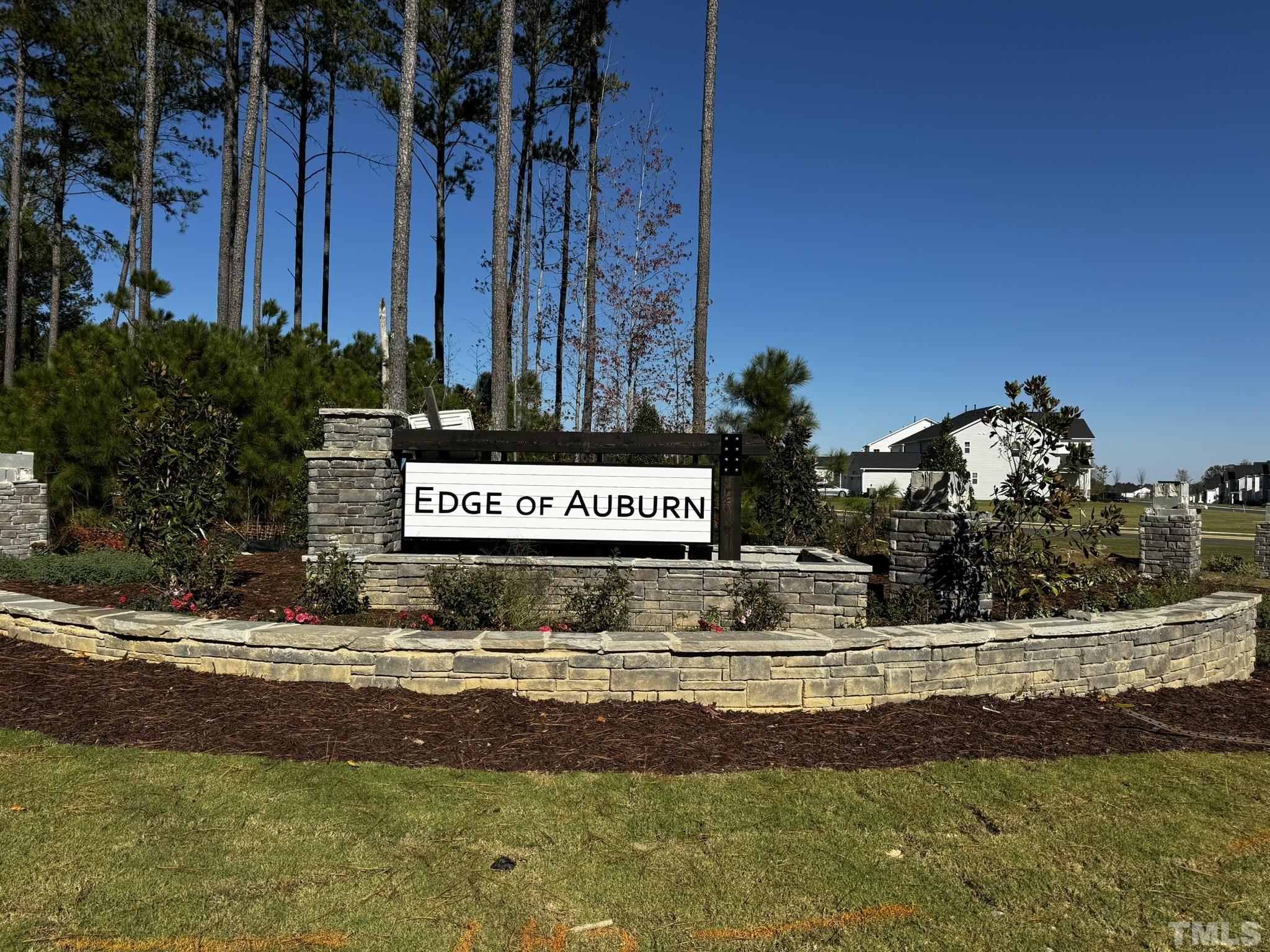 192 Edge Of Auburn Boulevard Raleigh, NC 27610 - Photo 39 of 44 a view of a park with a building in the background