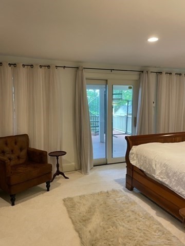 10 Shore Road Plymouth, MA 02360 - Photo 17 of 36 a bedroom with a bed and a couch