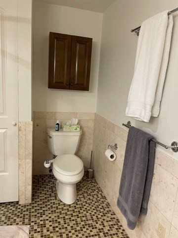 10 Shore Road Plymouth, MA 02360 - Photo 24 of 36 a bathroom with a toilet and a shower