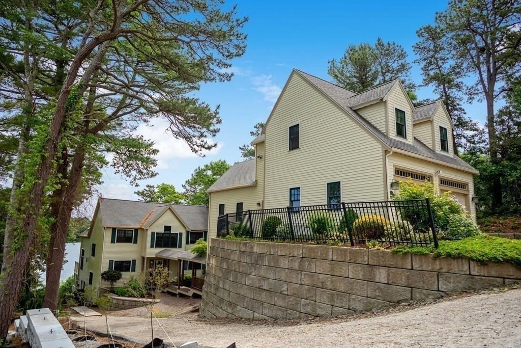 10 Shore Road Plymouth, MA 02360 - Photo 3 of 36 a front view of a house with garden