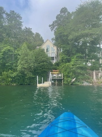 10 Shore Road Plymouth, MA 02360 - Photo 34 of 36 a view of a lake with a yard