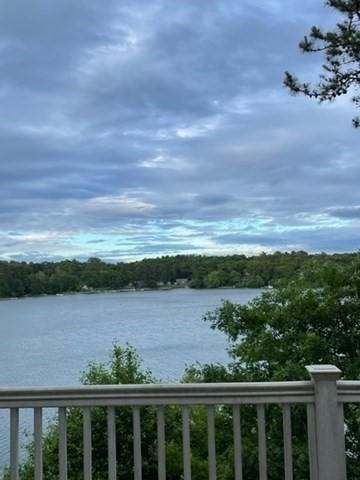 10 Shore Road Plymouth, MA 02360 - Photo 4 of 36 a view of city and mountain from a lake