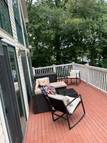 10 Shore Road Plymouth, MA 02360 - Photo 7 of 36 a balcony with wooden floor outdoor seating