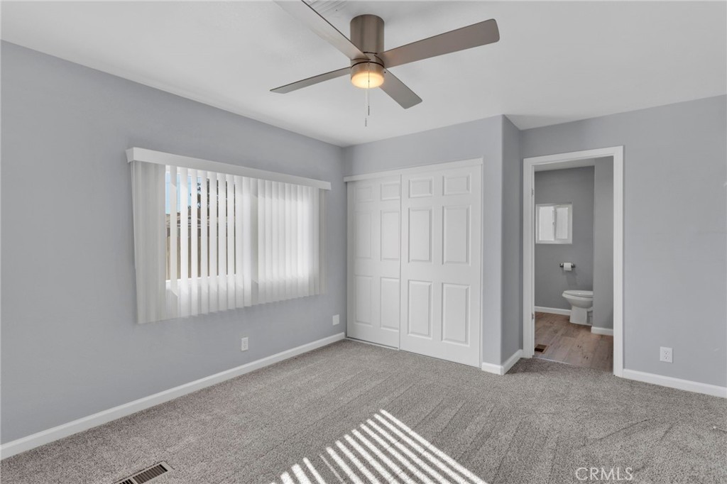 15252 Seneca Road, Unit 221 Victorville, CA 92392 - Photo 13 of 29 a view of an empty room with a window