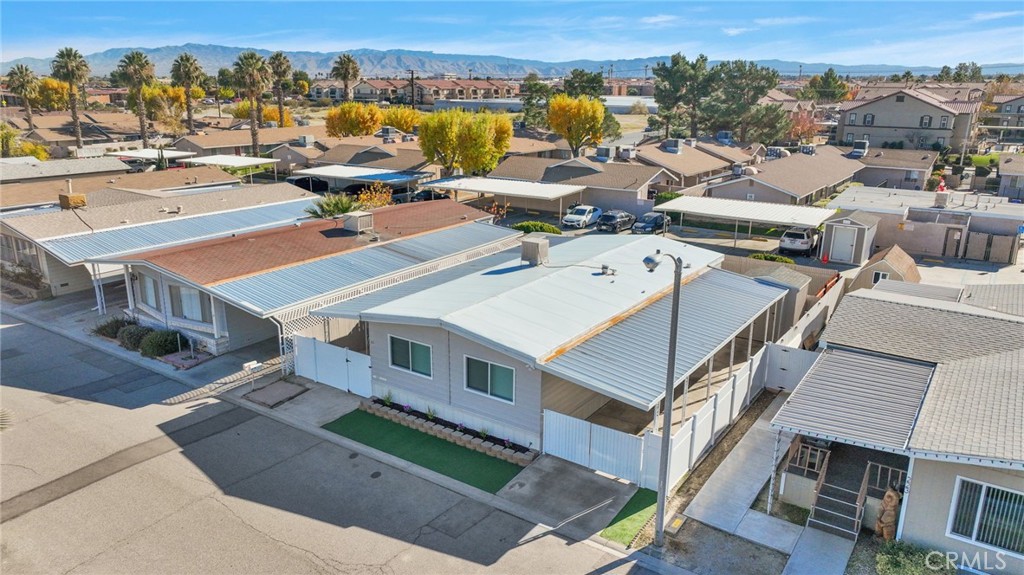 15252 Seneca Road, Unit 221 Victorville, CA 92392 - Photo 22 of 29 an aerial view of a house with a yard