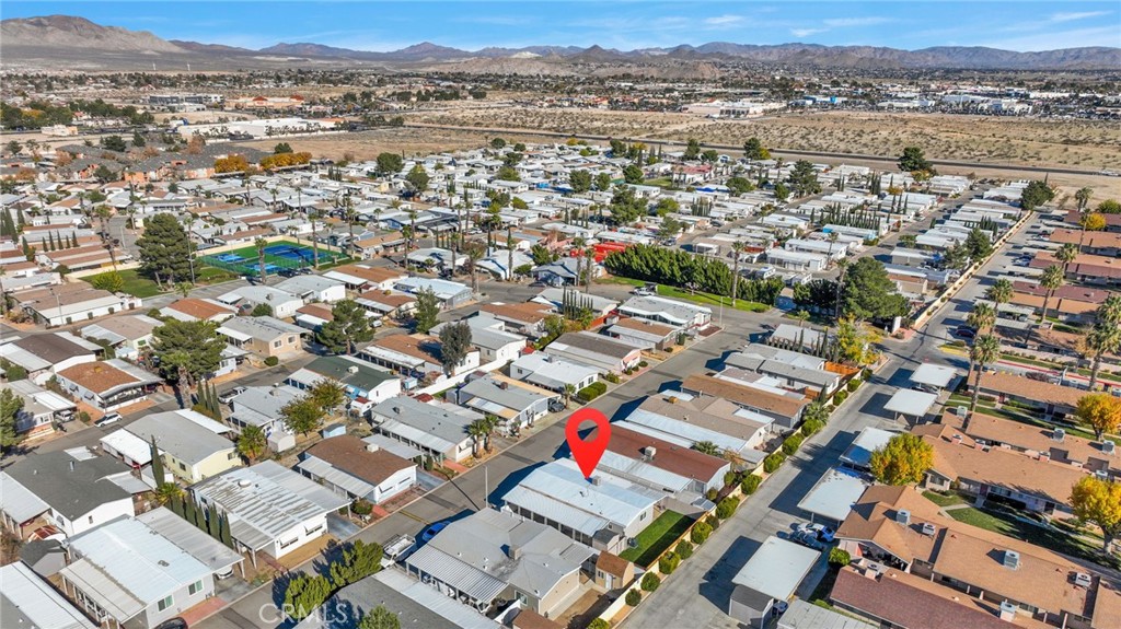 15252 Seneca Road, Unit 221 Victorville, CA 92392 - Photo 26 of 29 an aerial view of a city with lots of residential buildings