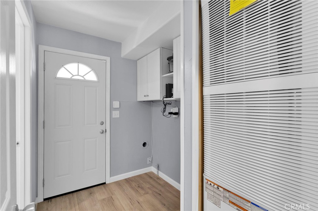 15252 Seneca Road, Unit 221 Victorville, CA 92392 - Photo 10 of 29 a view of empty room with wooden floor