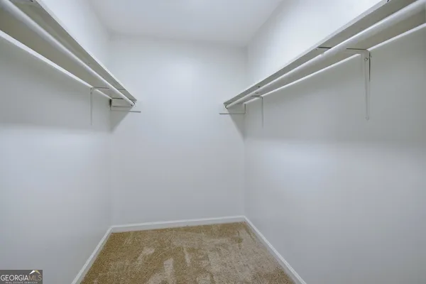 a view of a room with racks on the wall