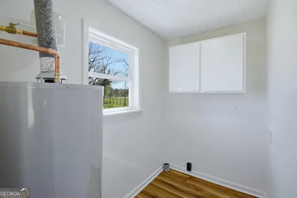 a view of a closet area with window