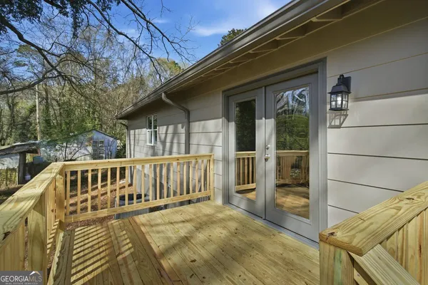 a view of a deck with a yard