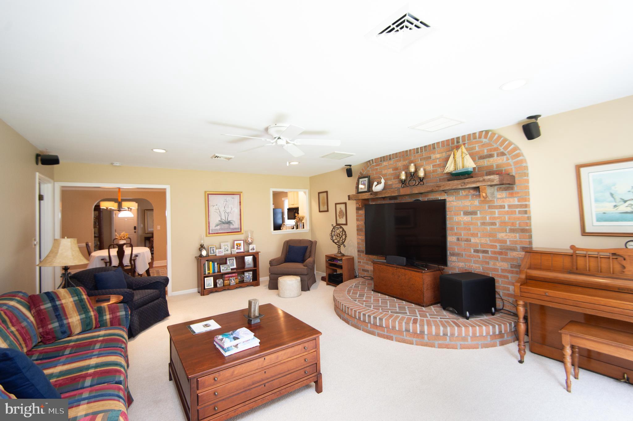 412 Talbot Avenue Cambridge, MD 21613 - Photo 14 of 32 a living room with furniture and a flat screen tv