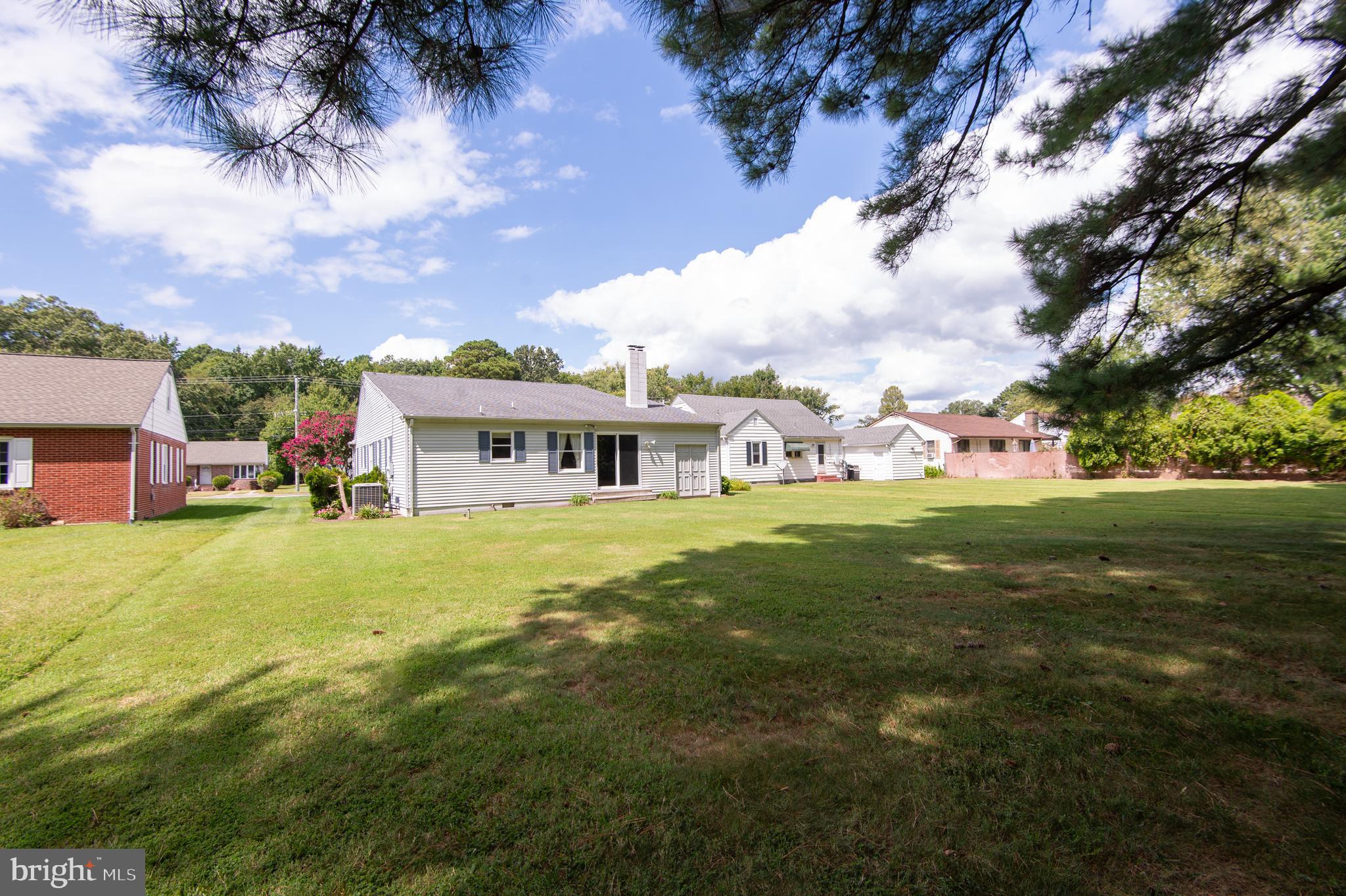 412 Talbot Avenue Cambridge, MD 21613 - Photo 26 of 32 a front view of house with yard and trees
