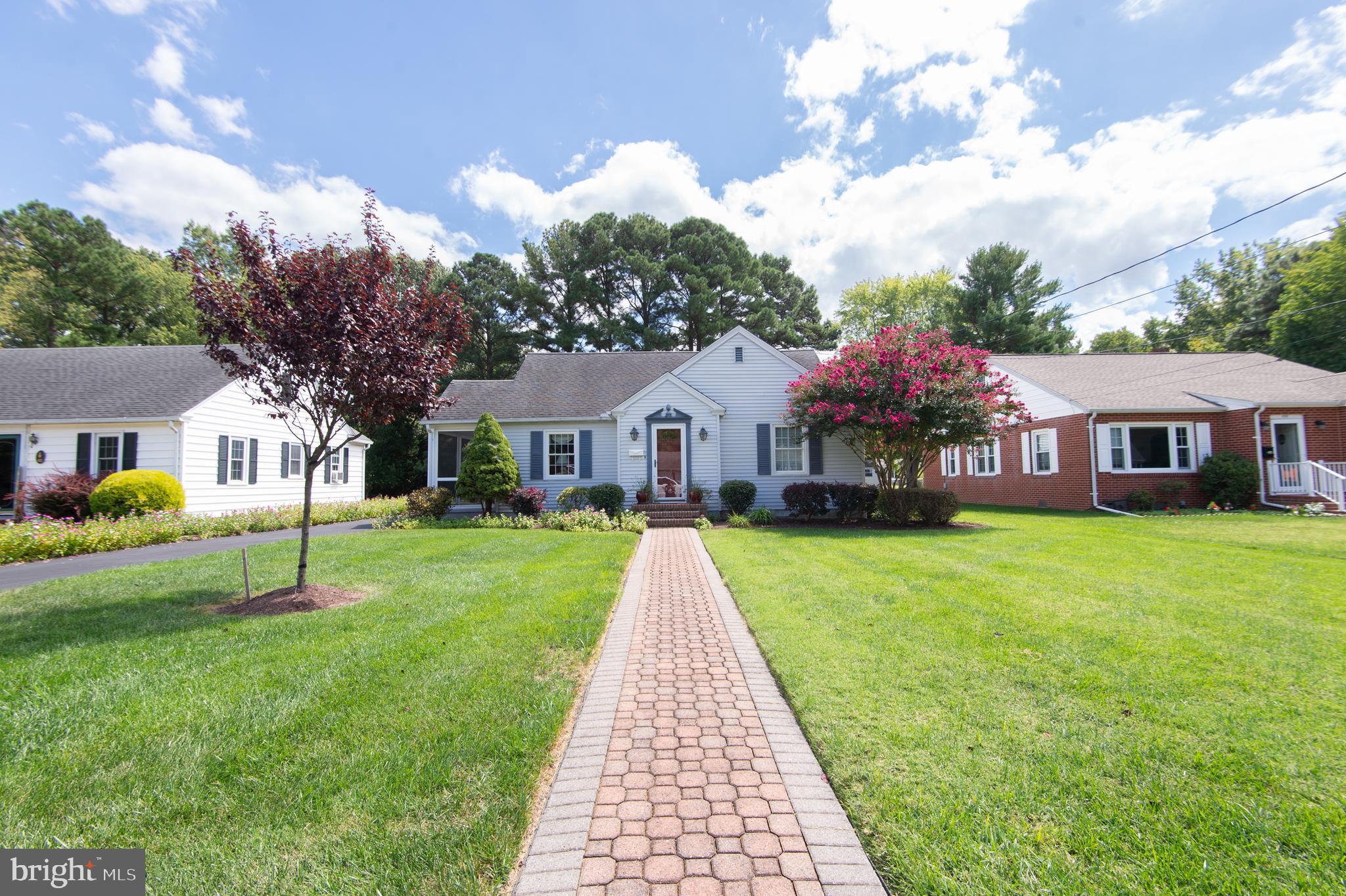 412 Talbot Avenue Cambridge, MD 21613 - Photo 30 of 32 a front view of a house with a yard and trees