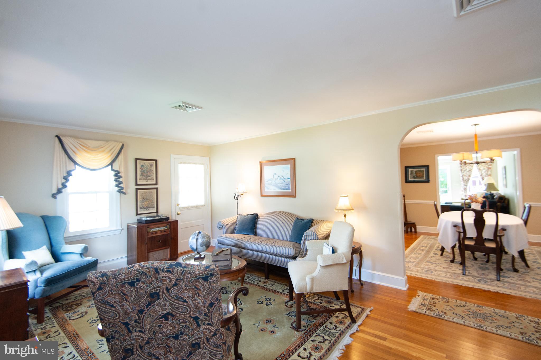 412 Talbot Avenue Cambridge, MD 21613 - Photo 31 of 32 a living room with furniture and a wooden floor