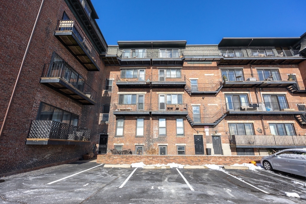 20 Beacon Street, Unit 2 Chelsea, MA 02150 - Photo 32 of 40 a front view of a multi story building