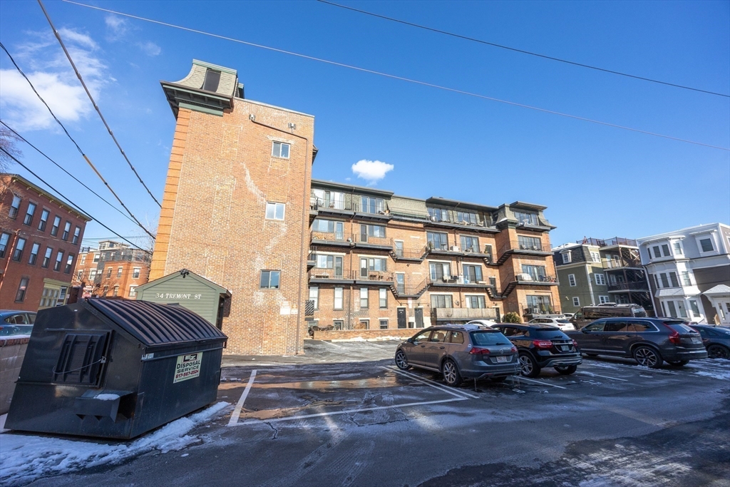20 Beacon Street, Unit 2 Chelsea, MA 02150 - Photo 37 of 40 a car parked in front of a building