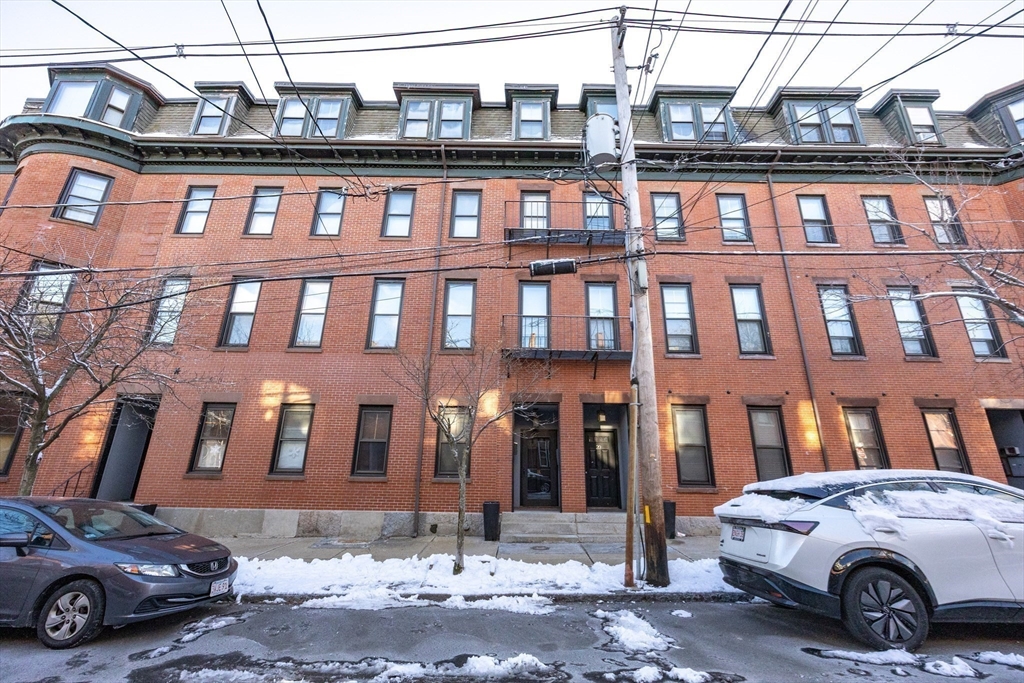 20 Beacon Street, Unit 2 Chelsea, MA 02150 - Photo 40 of 40 a car parked in front of a building