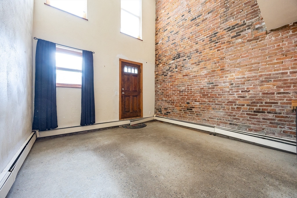 20 Beacon Street, Unit 2 Chelsea, MA 02150 - Photo 10 of 40 a view of an empty room with a window