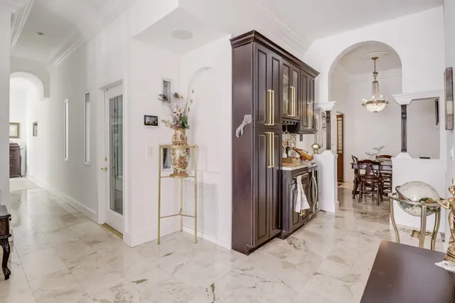 a view of a kitchen with furniture and a kitchen
