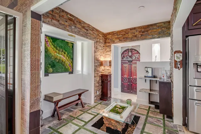 a living room with furniture and window