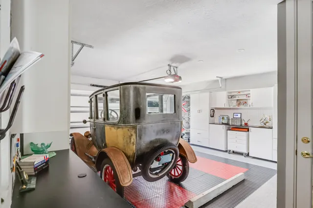a living room with furniture and next to a window