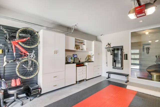 a white toilet sitting next to a bathroom sink