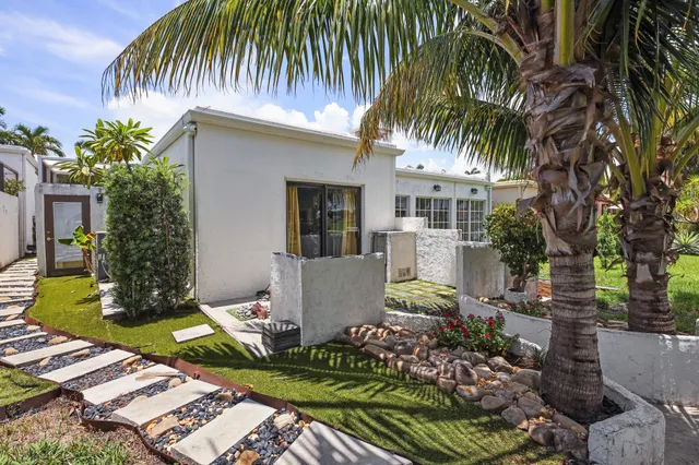 a view of a golf course with a garden