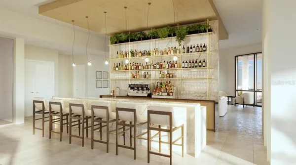a large kitchen with a table and chairs