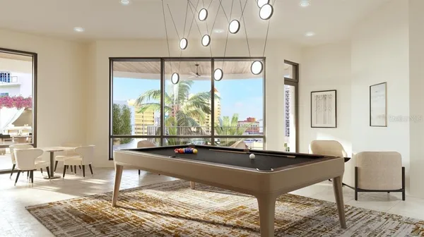 a room with table chairs and wooden floor