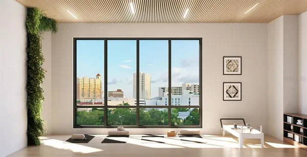 a view of a balcony with furniture