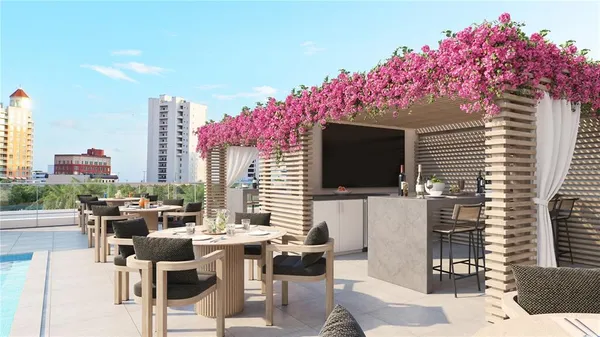 a dining room with furniture and wooden floor