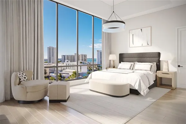 a bedroom with bed and glass windows