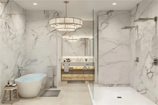 a bathroom with a bathtub and shower