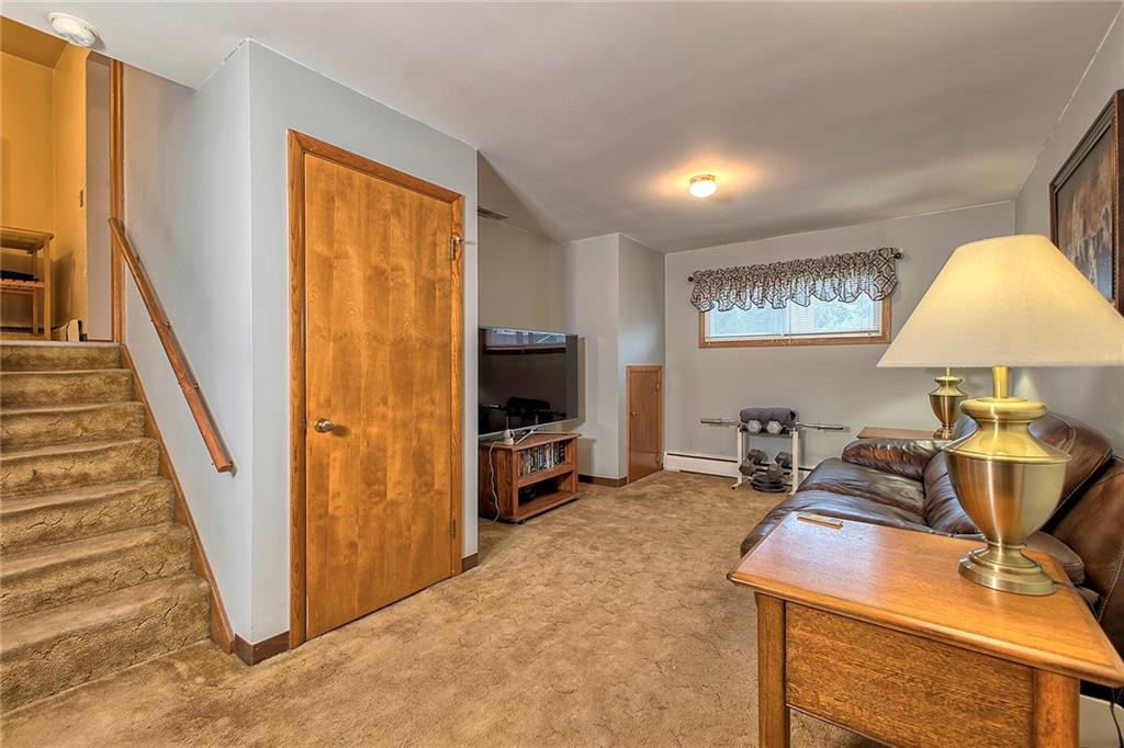 1119 Church Street Indiana, PA 15701 - Photo 21 of 34 a room with furniture and a flat screen tv