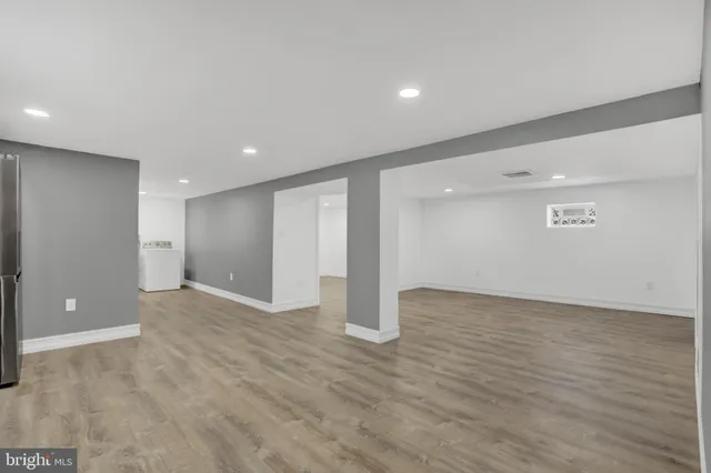 a view of kitchen with wooden floor