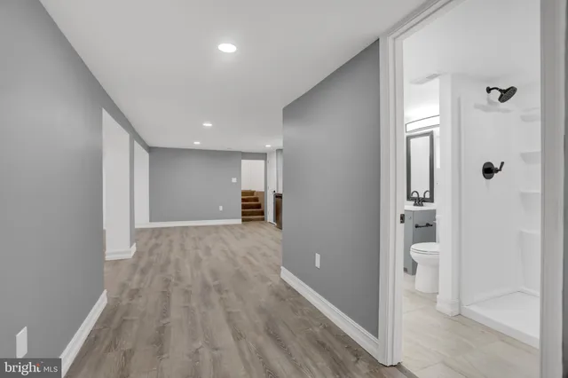 a view of a kitchen with a stove top oven