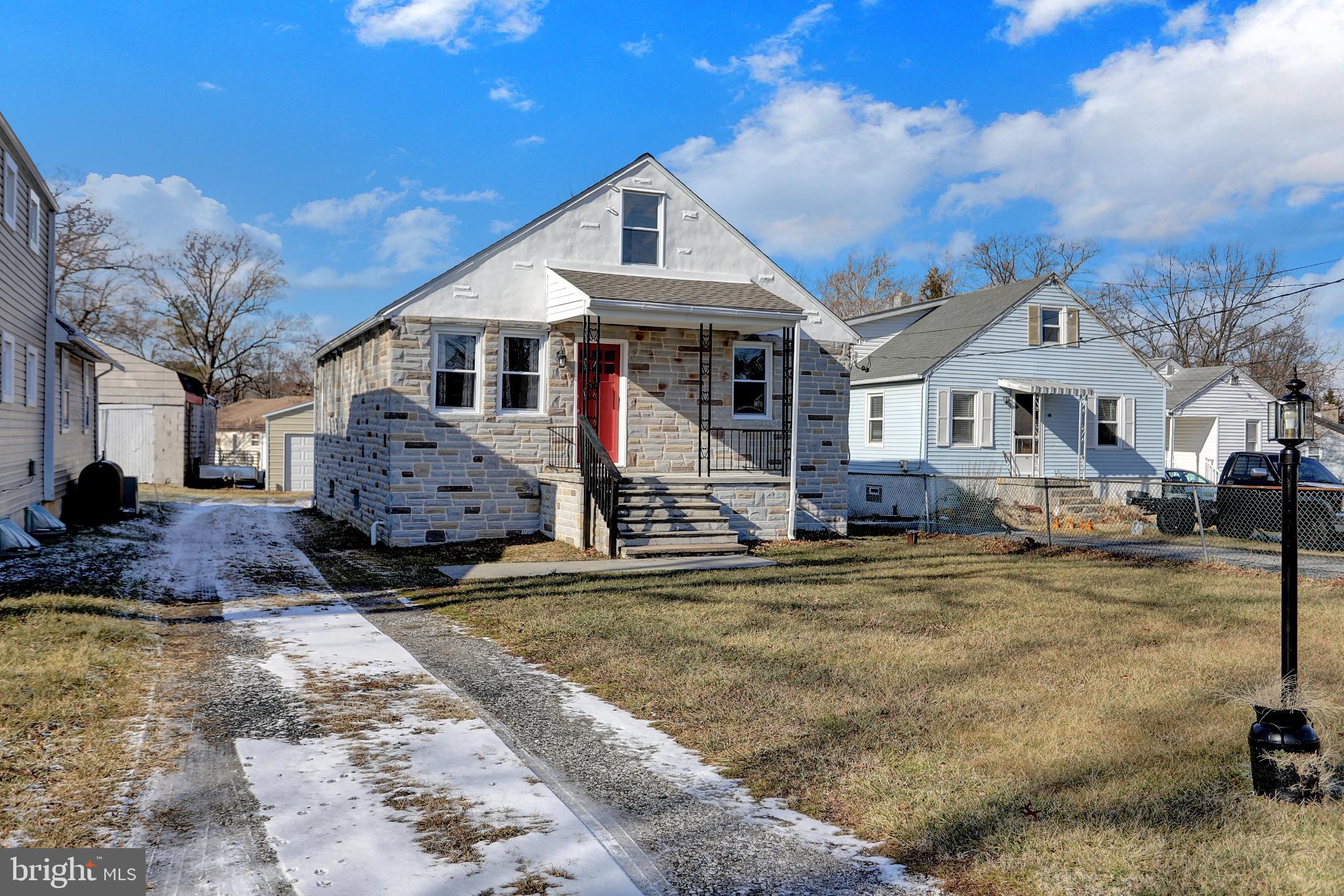 9036 Simms Court Parkville, MD 21234 - Photo 48 of 52 a front view of a house with a yard