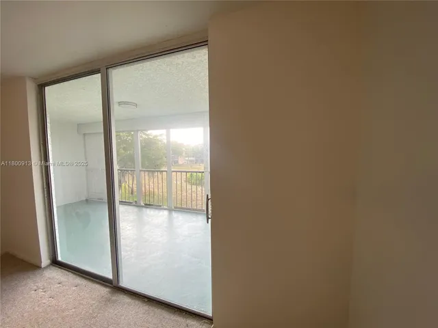 a view of a glass door and a glass door