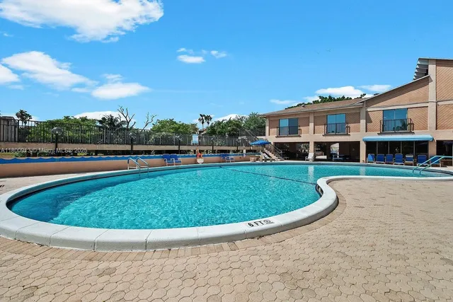 a view of outdoor space yard and swimming pool