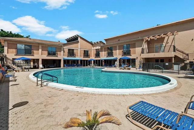 a view of a house with a swimming pool